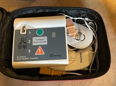 WNL AED Trainer with Adult and Pediatric pads for CPR training. With box and bag