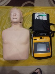 AED Trainer 1000 with CPRTraining Manikin Excellent ConditionUsed Only Few Times